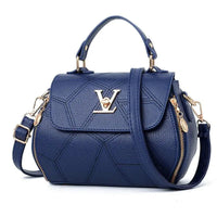 Elegant leather tote bag by MANDOTOS, featuring a sleek design with sturdy handles and spacious interior.