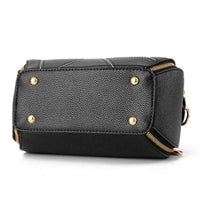 Elegant leather tote bag by MANDOTOS featuring sleek design and sturdy handles, perfect for stylish everyday use.