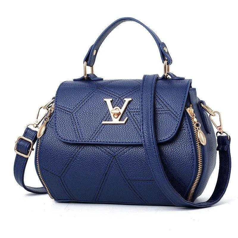 Elegant leather tote bag by MANDOTOS with sturdy handles and sleek design, perfect for everyday use.