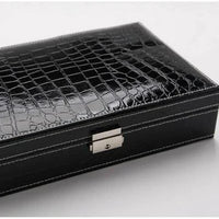 Elegant leather vanity case by MANDOTOS with a sleek design and multiple compartments for cosmetics and personal items.