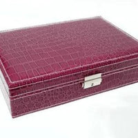 Elegant leather vanity case by MANDOTOS with a structured design, featuring a clasp closure and handle for travel and storage.