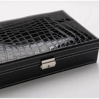 Elegant leather vanity case by MANDOTOS with a sleek design, featuring a secure clasp and spacious interior for cosmetics and accessories.