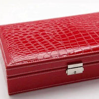 Elegant leather vanity case by MANDOTOS with a classic design and brass hardware, perfect for travel and daily use.