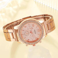 Mandotos elegant rose gold watch ensemble featuring a stylish watch with matching accessories on a neutral background.