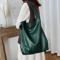 Elegant women's tote bag by MANDOTOS featuring a sleek design and spacious interior for versatile everyday use.