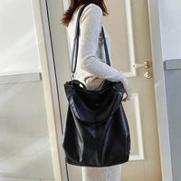 Elegant women's tote bag by MANDOTOS with structured design and spacious interior, perfect for casual or professional use.