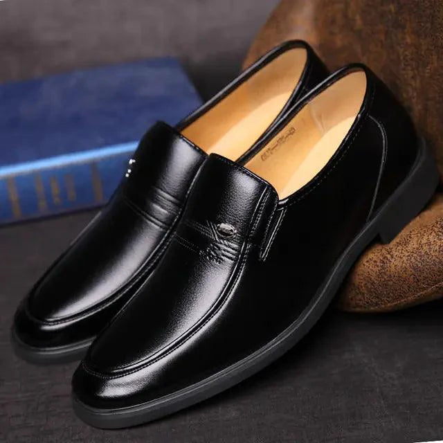 Mandotos Elite leather dress shoes displaying sleek black leather with polished finish and classic lace-up design.