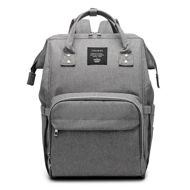 Mandotos fashion mummy maternity nappy bag with multiple compartments and stylish design, perfect for new moms.