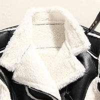 Mandotos faux leather cropped jacket featuring a classic collar, zip front, and fitted style for a trendy look.