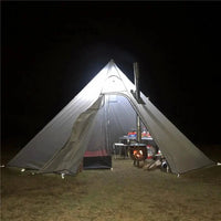 Mandotos Featherlight Pyramid Camp Shelter set up outdoors, showcasing lightweight, durable fabric and pyramid shape for camping shelter.