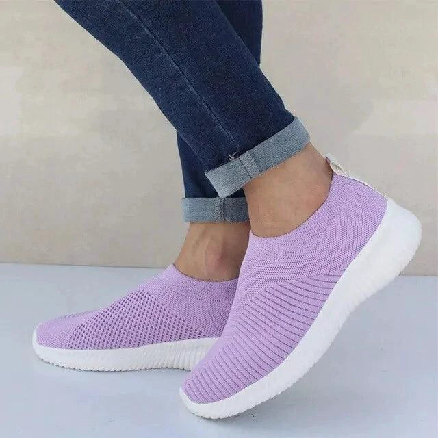 Mandotos flat knitted shoes with a soft, flexible design and a stylish, comfortable fit for casual wear.