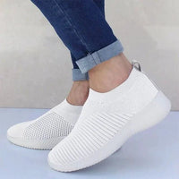 Mandotos flat knitted shoes with a comfortable, stylish design featuring a soft, textured knit upper and casual slip-on style.