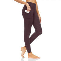 Mandotos FlexiForm high-waist fitness leggings showing a close-up of black stretchy workout leggings with a high waistband and seamless design.