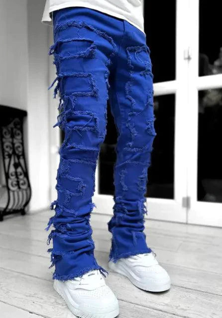 Mandotos FlexiStyle denim jeans featuring classic five-pocket design and slim fit, shown on a model.
