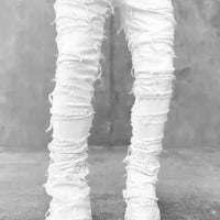 Mandotos FlexiStyle denim jeans showing fit, classic five-pocket design, and medium wash fabric on a mannequin.