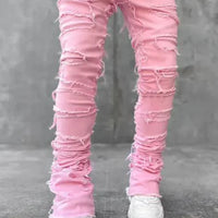 Mandotos FlexiStyle denim jeans showing slim fit design, classic blue color, and five-pocket style on a plain background.