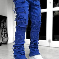 Mandotos FlexiStyle denim jeans with classic five-pocket design and slim fit, shown on a model against a neutral background.