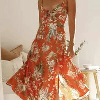 Mandotos floral boho chic midi dress with flowing fabric and vibrant floral pattern, perfect for casual or bohemian style.