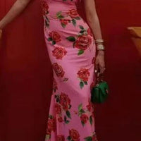 Mandotos Floral Elegance Puff Sleeve Dress featuring a floral pattern, puff sleeves, and a fitted waist for a stylish look.