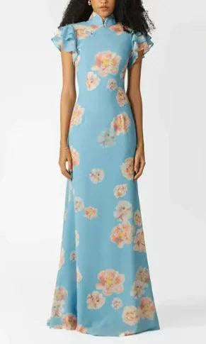 Mandotos floral elegance puff sleeve dress featuring a fitted bodice, floral print, and voluminous puff sleeves.