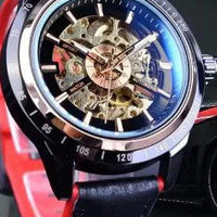 Mandotos Forsining Scarlet leather strap wristwatch with round dial and silver accents.