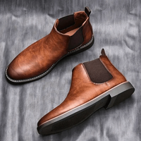 Mandotos Gentleman's Choice leather boots with classic design, featuring polished brown leather and sturdy soles for stylish durability.