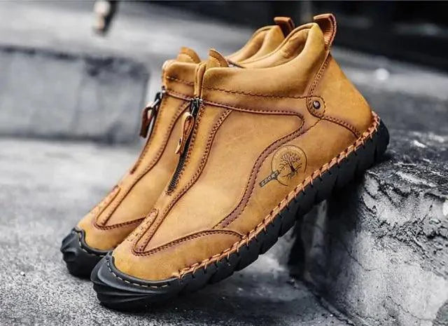 Mandotos men's leather loafers with classic design, featuring polished brown leather and slip-on style for casual or formal wear.