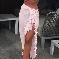 Mandotos GlamourWave chiffon beach wrap draped over a model, showcasing lightweight, elegant fabric for sunny beach days