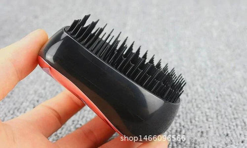 GlamWave Luxe Hair Styling Brush with Detangling Bristles for Effortless Shine - MANDOTOS