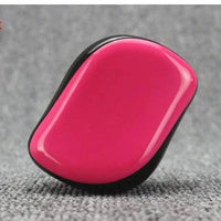 Mandotos GlamWave Luxe hair styling brush with detangling bristles for smooth, shiny hair and effortless styling.