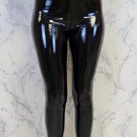 Glossy latex leather leggings by MANDOTOS featuring a shiny finish and fitted design, perfect for bold fashion statements.