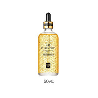Mandotos Gold Essence Hyaluronic Serum in a sleek glass bottle, showcasing the luxurious packaging and serum inside.