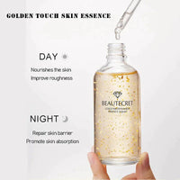 Mandotos Gold Essence Hyaluronic Serum bottle with dropper, showing luxurious gold packaging and clear serum inside.