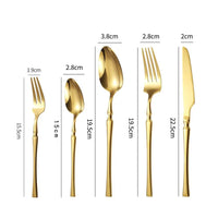 Gold Glamour 30-piece dinner set by MANDOTOS featuring elegant plates, bowls, and mugs for stylish dining.