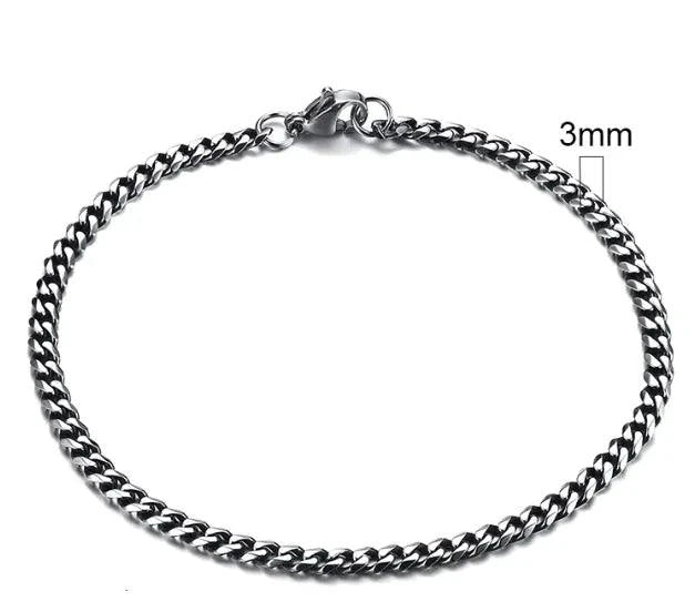Gold-tone stainless steel Cuban bracelet from MANDOTOS, 3-11mm width, featuring a sleek, polished chain design.