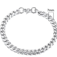 Gold-tone stainless steel Cuban bracelet, 3-11mm width, by MANDOTOS featuring a bold, polished chain design.