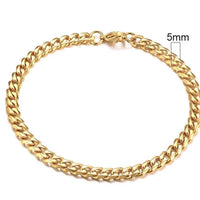 Gold-tone stainless steel Cuban bracelet by MANDOTOS with 3-11mm wide links, showcasing a polished, stylish jewelry piece.
