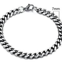 Gold-tone stainless steel Cuban bracelet with 3-11mm links from MANDOTOS, showcasing a sleek and polished design.