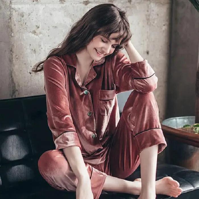Gold velvet pajamas by MANDOTOS featuring a soft, luxurious fabric and relaxed fit for comfortable sleepwear.