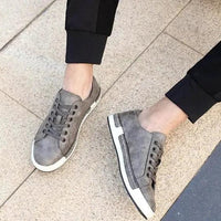 Mandotos handmade men's casual trainer shoes with closed toe design, featuring stylish stitching and comfortable sole.