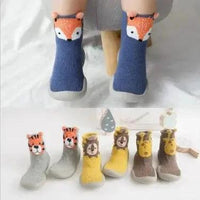 Mandotos Happy Feet toddler shoes in bright colors, featuring soft soles and adjustable straps for young children's comfort.