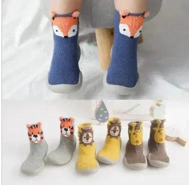 Mandotos Happy Feet toddler shoes in vibrant colors, featuring soft soles and easy closures for little feet.