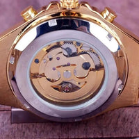 Mandotos hollow automatic mechanical watch with visible internal gears and sleek black strap, showcasing intricate craftsmanship.