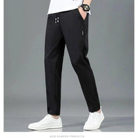 Mandotos Ice Silk men's summer casual pants in black and gray, featuring a straight-leg, elastic waistband, breathable and lightweight fabric.