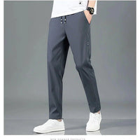 Mandotos Ice Silk men's summer casual pants in black and gray, breathable, elastic, straight-leg sweatpants for outdoor or business wear.