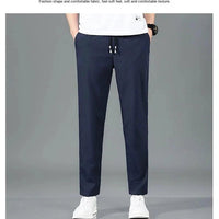 Mandotos Ice Silk men's summer casual pants in black and gray with elastic waistband, breathable straight-leg design, outdoor style.