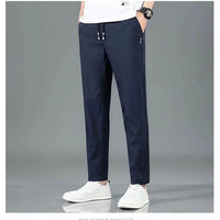 Mandotos Ice Silk men's summer black and gray casual pants with elastic waistband, breathable straight-leg design for outdoor wear.