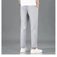 Mandotos Ice Silk men's summer pants in black and gray, breathable, elastic, straight-leg casual and outdoor sweatpants.