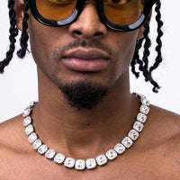 Mandotos Illumina Tennis Chain featuring clustered stones and radiant embellishments showcasing elegant jewelry design.