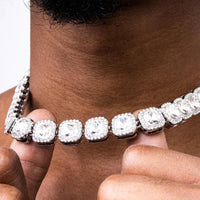 Mandotos Illumina tennis chain with clustered stones and radiant embellishments, showcasing elegant jewelry design.